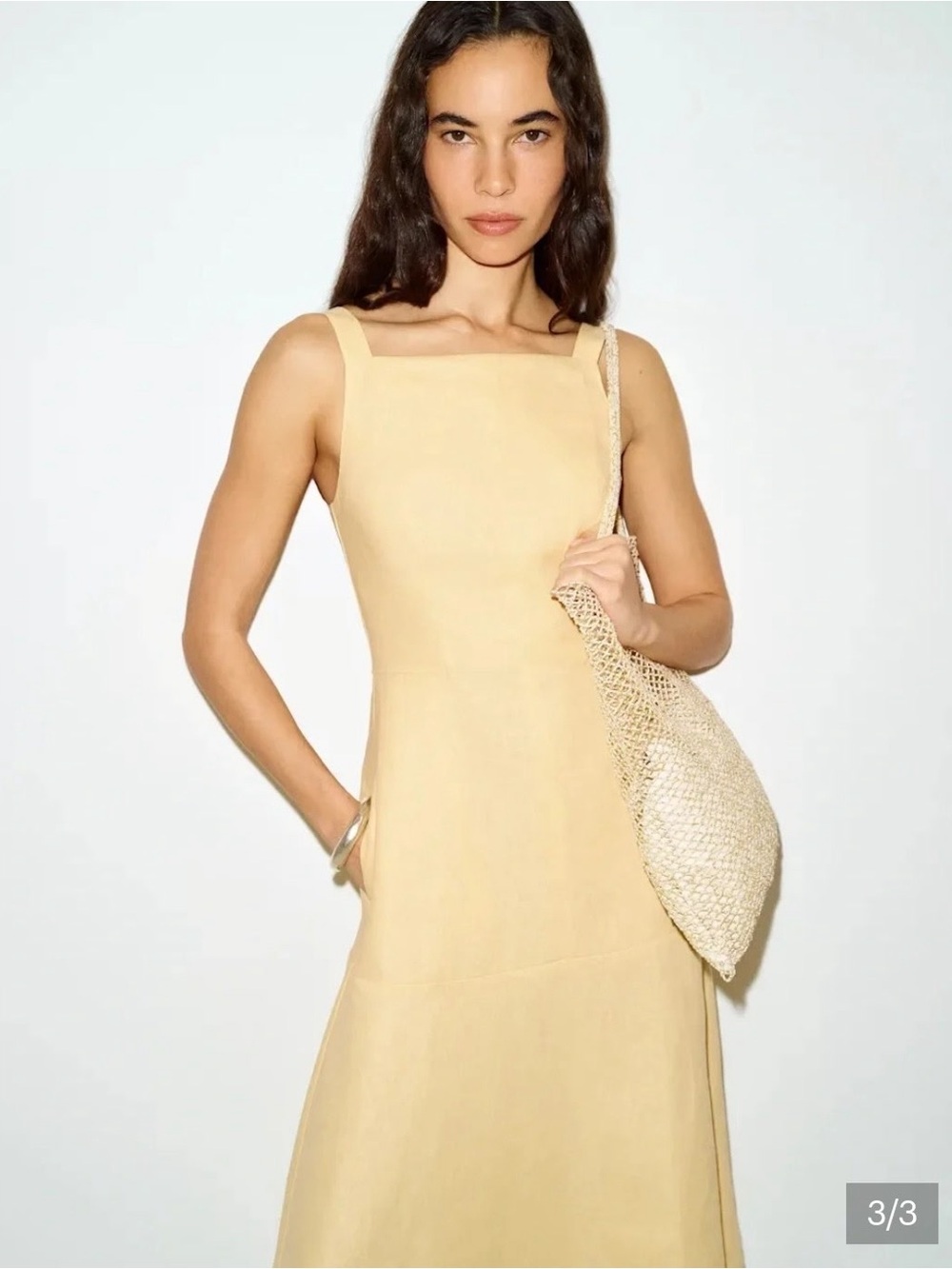 Pale yellow linen reformation midi dress